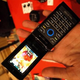 Illustration for article titled Kyocera Neo E1100 Brings OLED, Designer Sensibility to Low End Phone